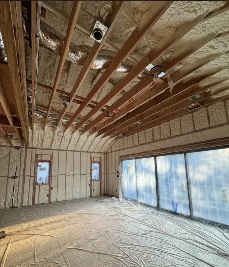 Interior walls and ceiling insulated with spray foam during new construction in Bayou Blue